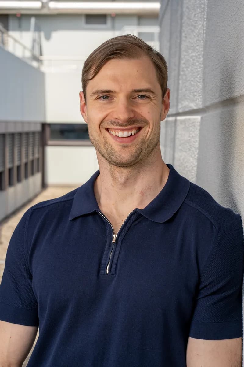 Headshot Smiling Industrial Background